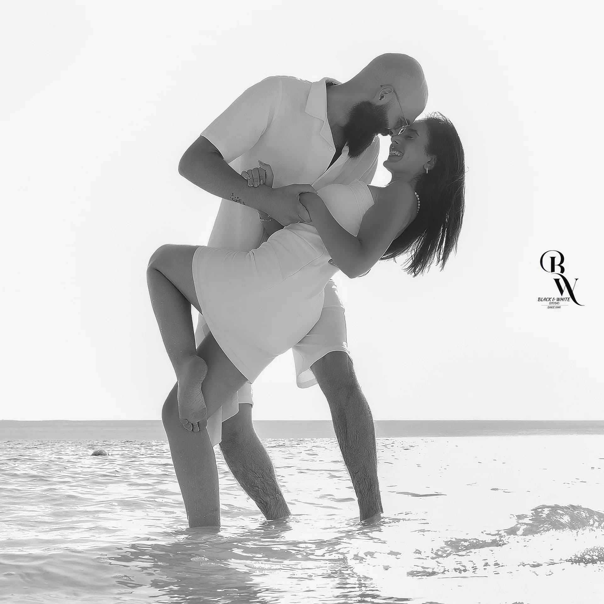 A kiss in the shallows of the Dead Sea, in black and white