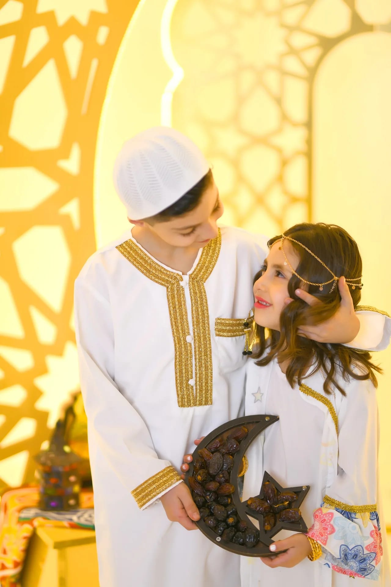 A father and daughter in the Ramadan set